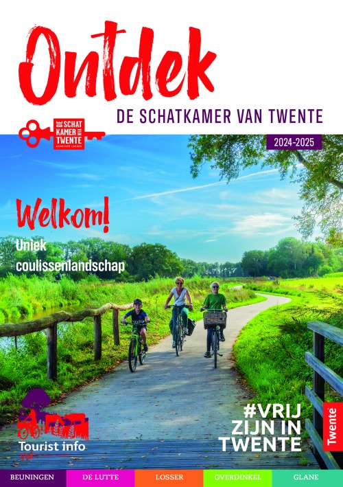 Fietsende mensen op een landelijk pad in Twente, ontdek de schatkamer van Twente 2024-2025